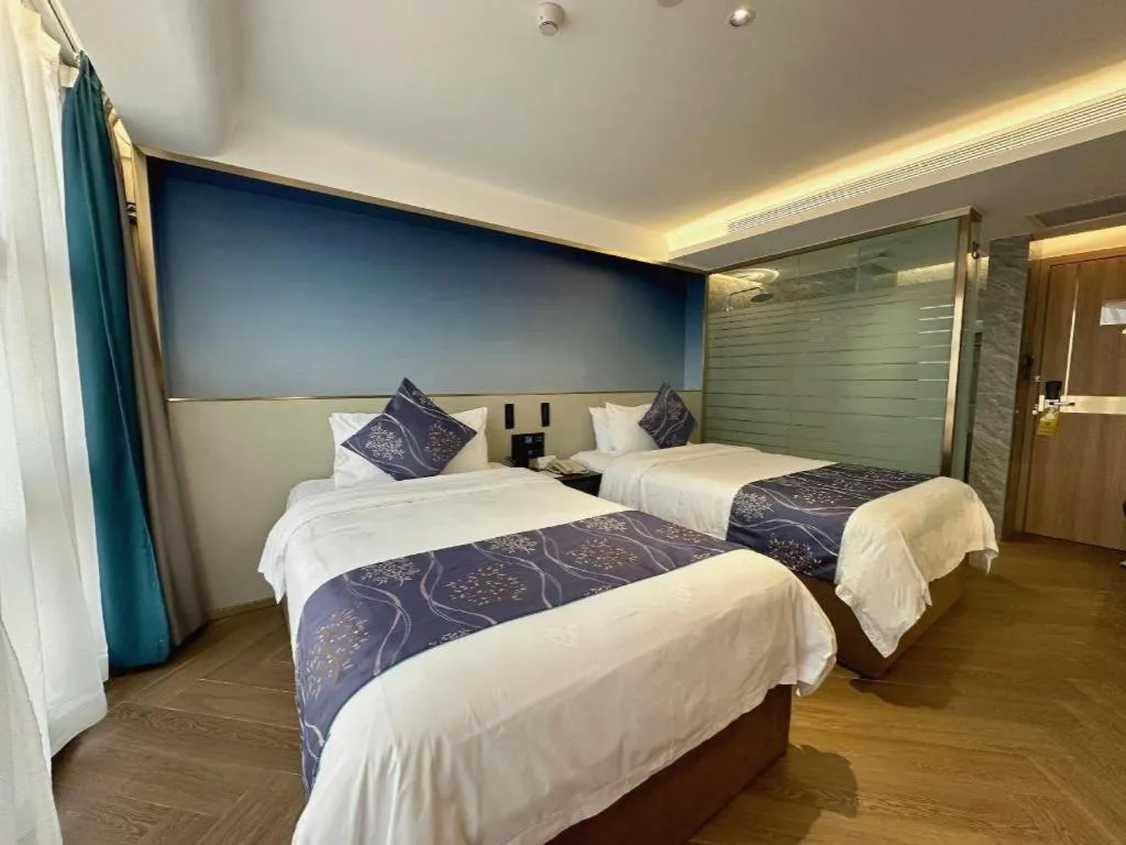 Bed in Xinyuan Hot Spring Hotel