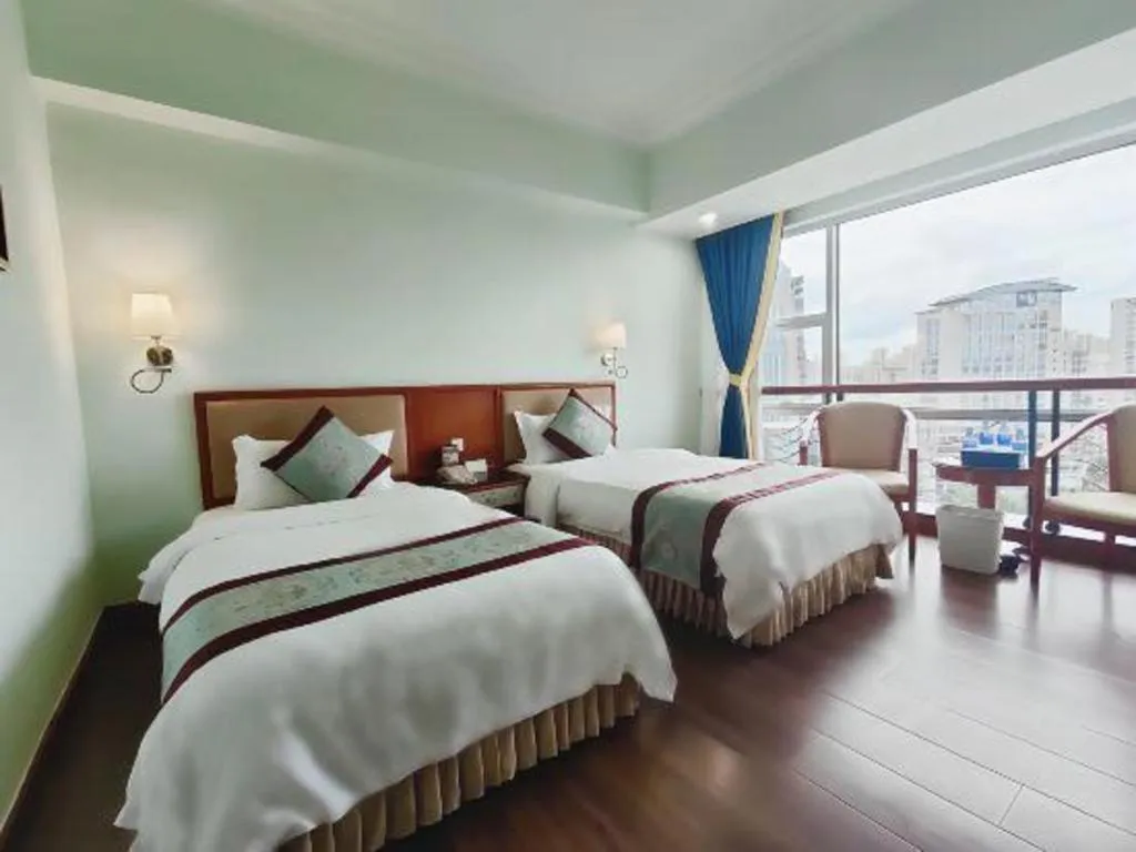Bed in Xinyuan Hot Spring Hotel