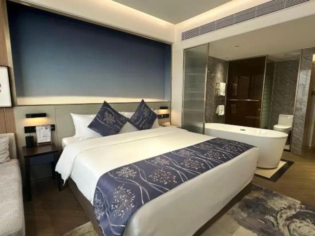 Bed in Xinyuan Hot Spring Hotel