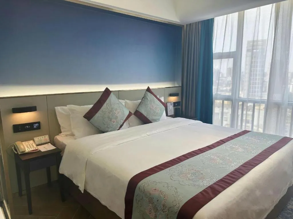 Bed in Xinyuan Hot Spring Hotel