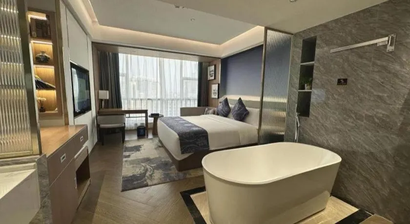 Bed in Xinyuan Hot Spring Hotel