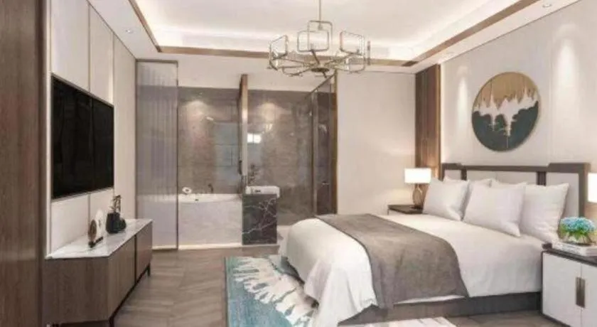 Bed in Xinyuan Hot Spring Hotel