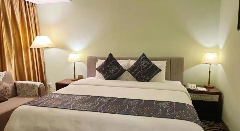 Bed in Xinyuan Hot Spring Hotel