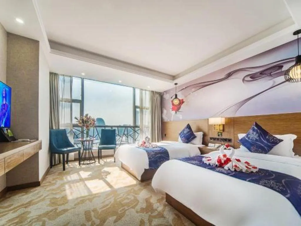 Bed in Xinyuan Hot Spring Hotel