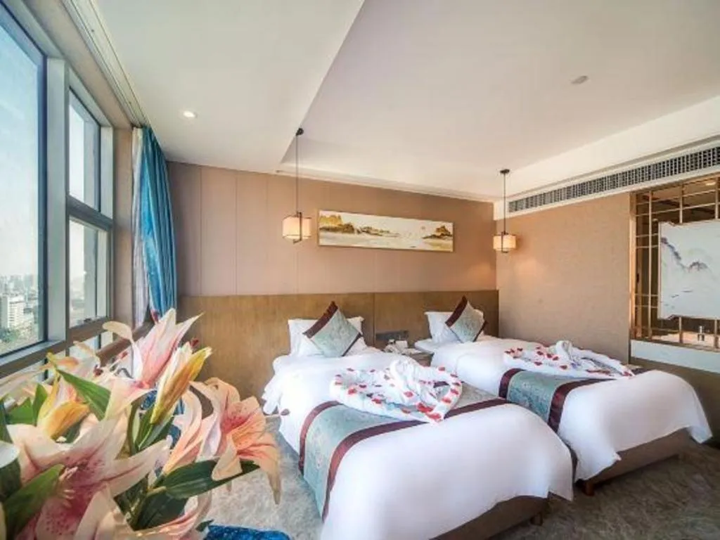 Bed in Xinyuan Hot Spring Hotel
