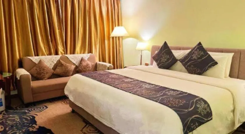 Bed in Xinyuan Hot Spring Hotel