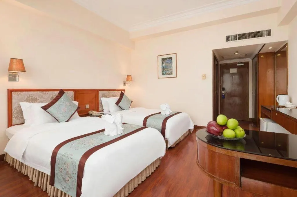 Bed in Xinyuan Hot Spring Hotel