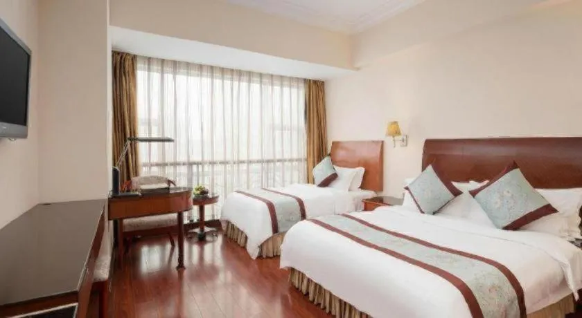 Bed in Xinyuan Hot Spring Hotel