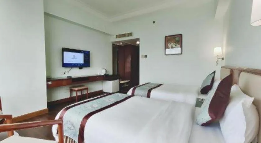 Bed in Xinyuan Hot Spring Hotel