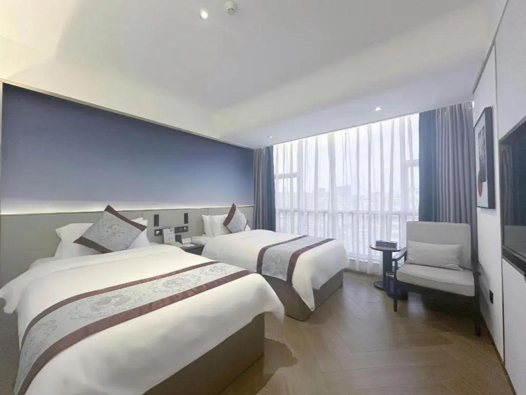 Bed in Xinyuan Hot Spring Hotel