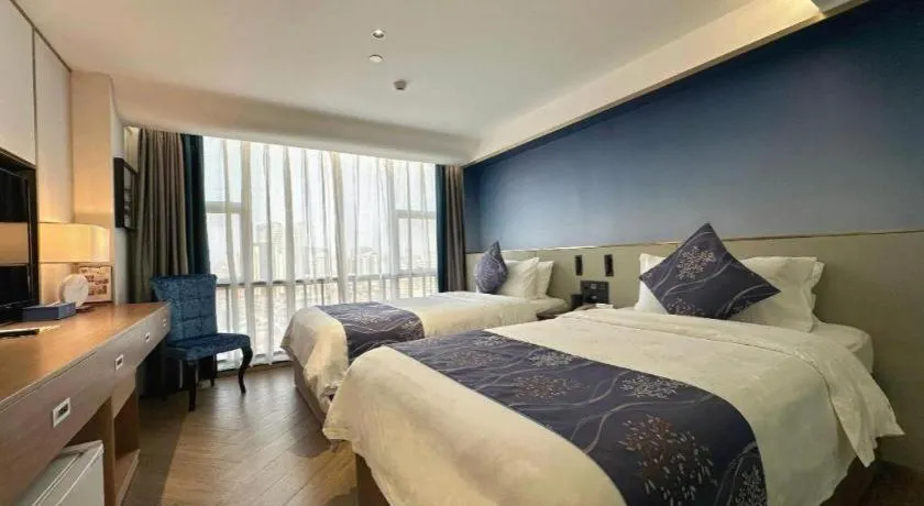 Bed in Xinyuan Hot Spring Hotel