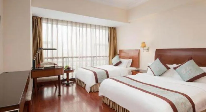 Bed in Xinyuan Hot Spring Hotel