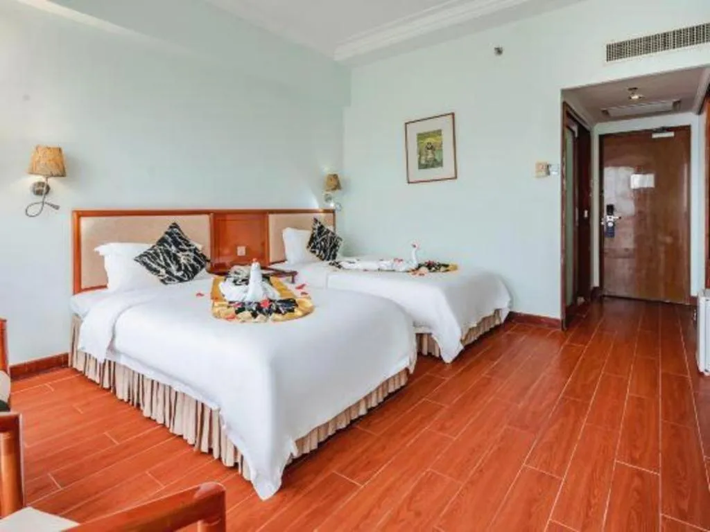 Bed in Xinyuan Hot Spring Hotel