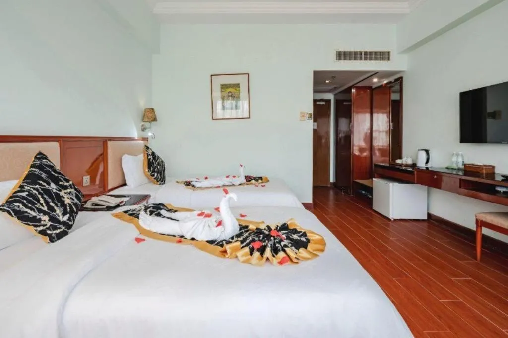 Bed in Xinyuan Hot Spring Hotel