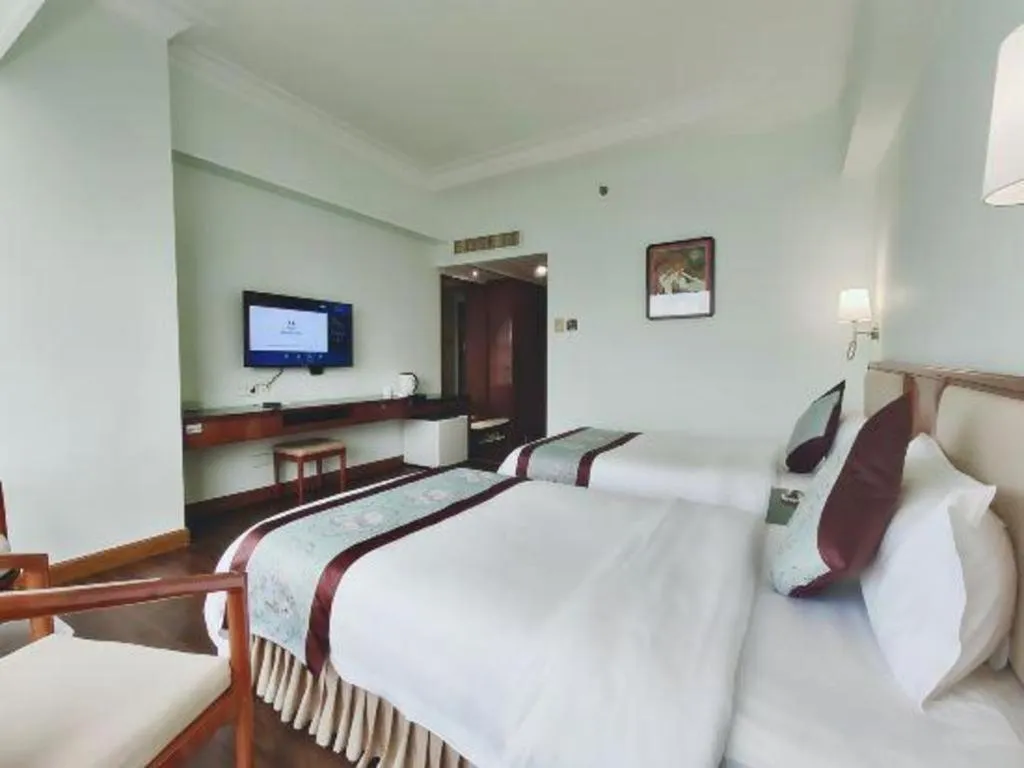 Bed in Xinyuan Hot Spring Hotel
