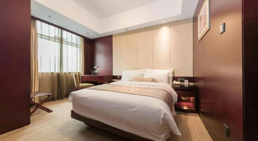 Bed in Dalian Liangyun Hotel