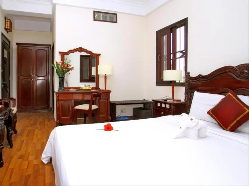 Bed in Hoi An Lantern Hotel