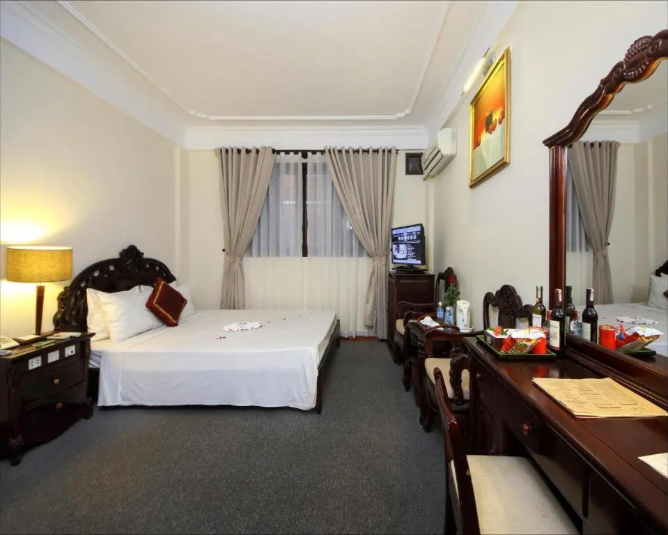 Bed in Hoi An Lantern Hotel