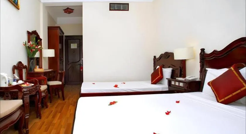 Bed in Hoi An Lantern Hotel