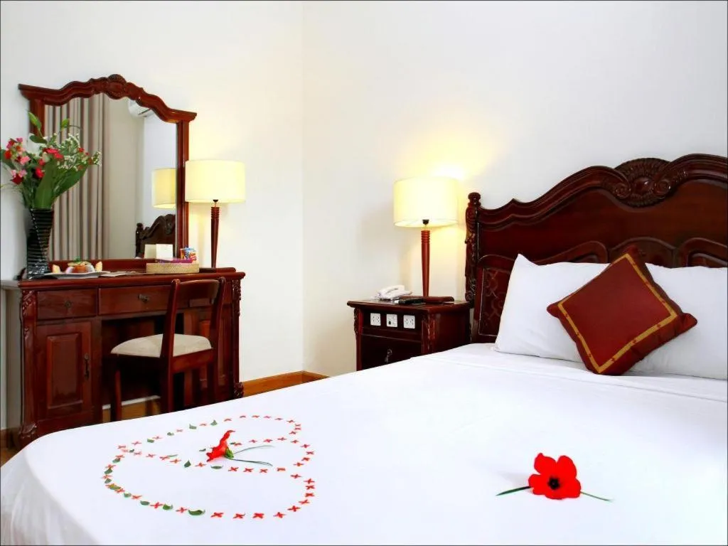 Bed in Hoi An Lantern Hotel