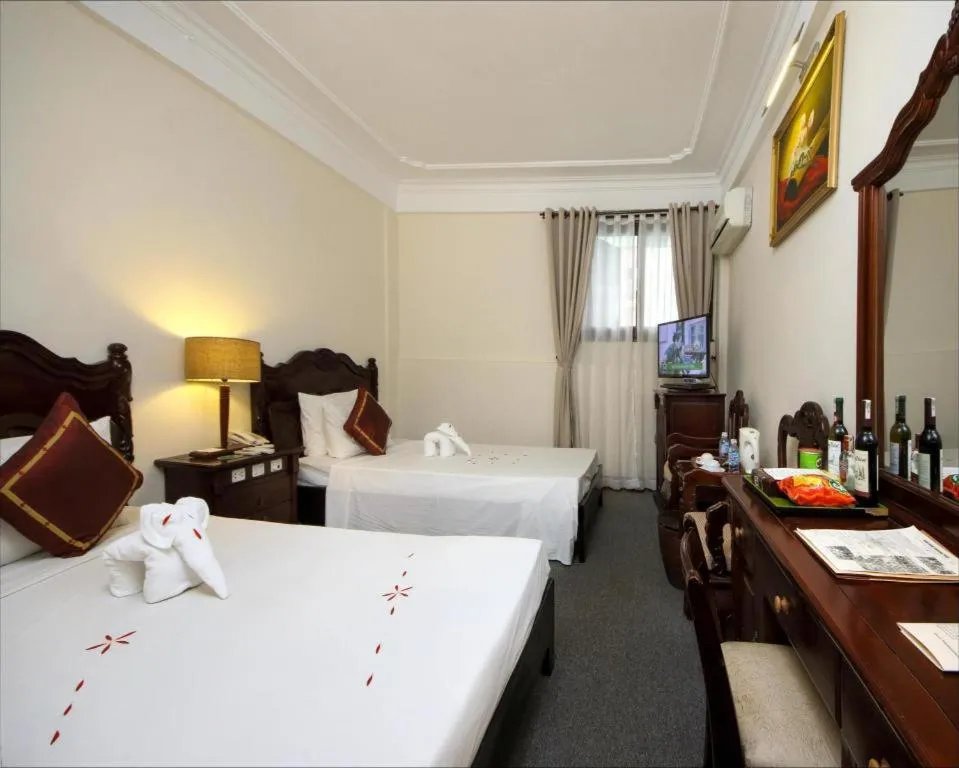 Bed in Hoi An Lantern Hotel