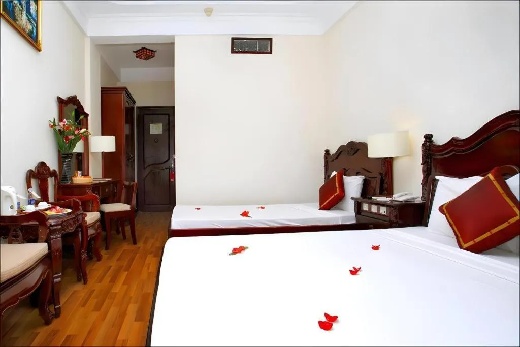 Bed in Hoi An Lantern Hotel