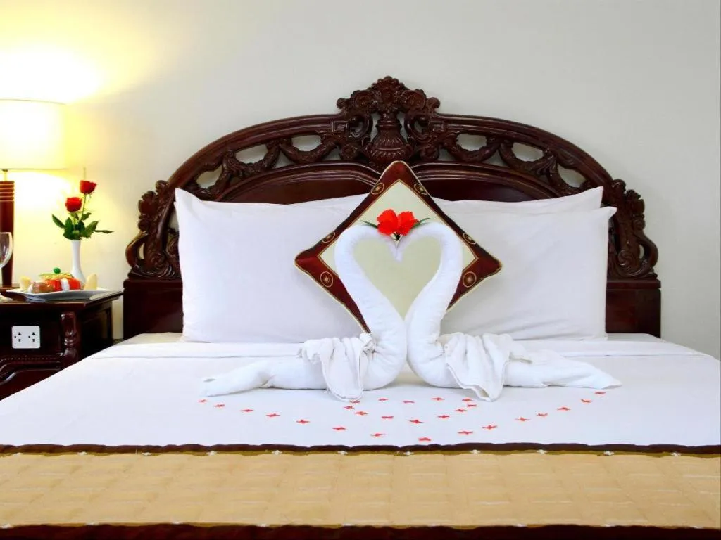 Bed in Hoi An Lantern Hotel