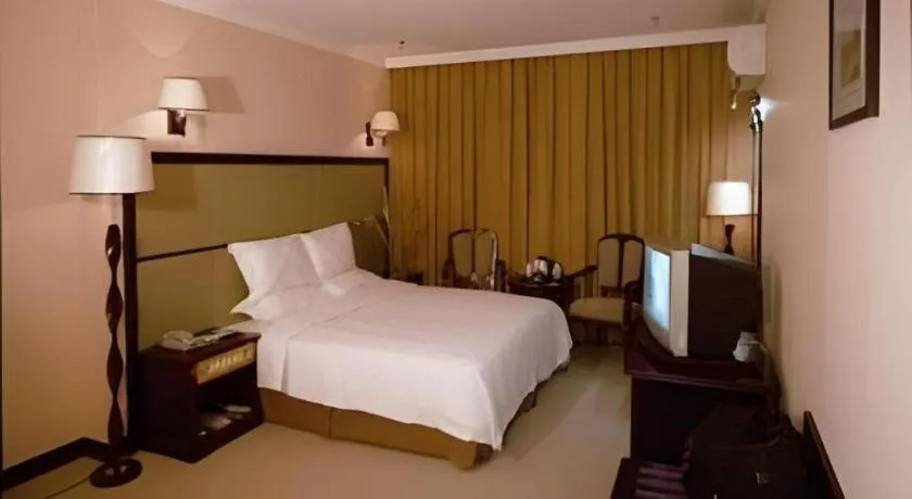 Bed in Sun Island Holiday Hotel