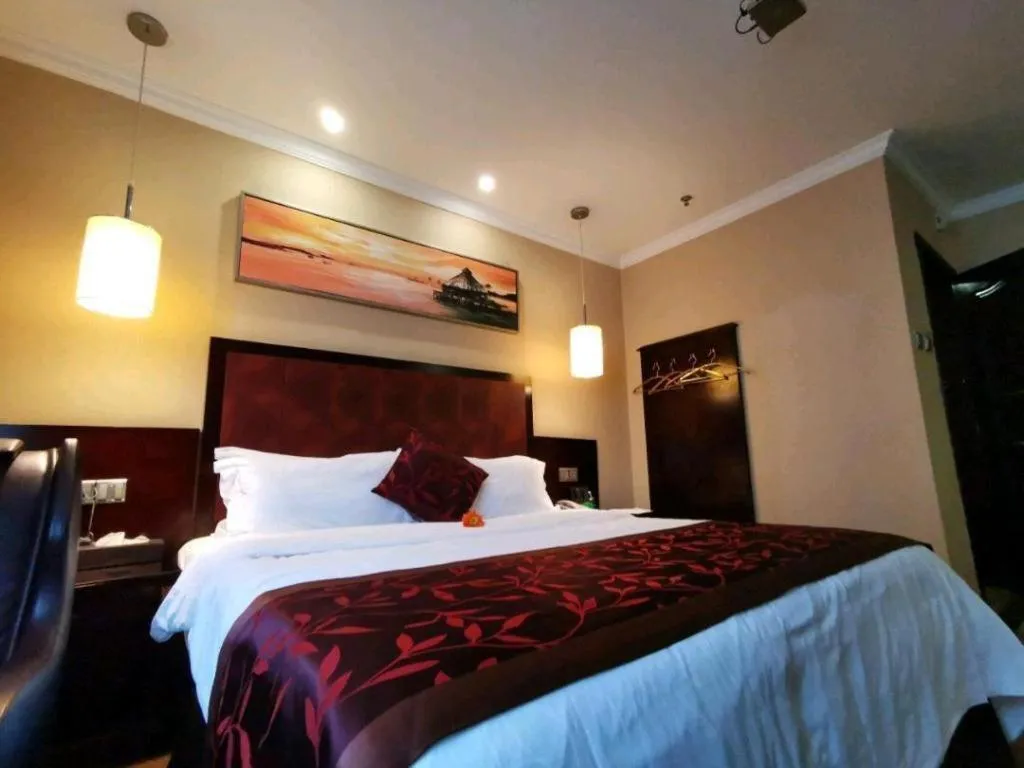 Bed in Sun Island Holiday Hotel