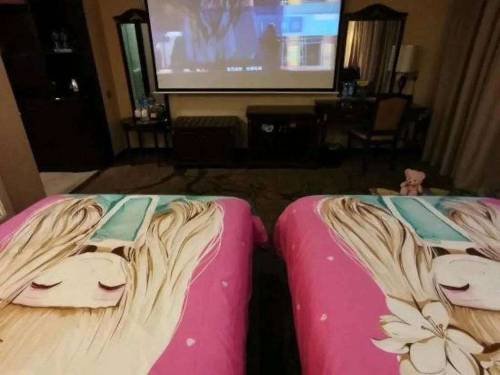 Bed in Sun Island Holiday Hotel