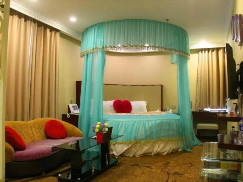 Bed in Sun Island Holiday Hotel