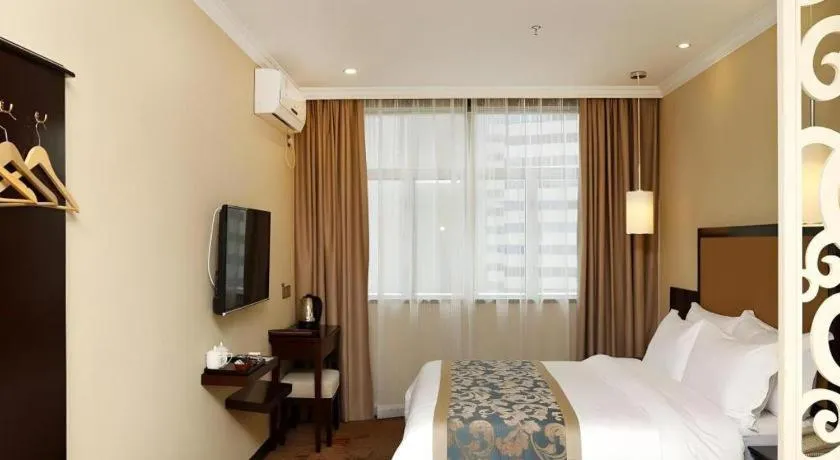 Bed in Sun Island Holiday Hotel