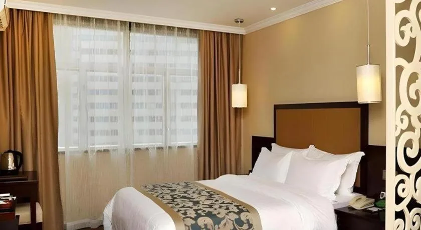 Bed in Sun Island Holiday Hotel