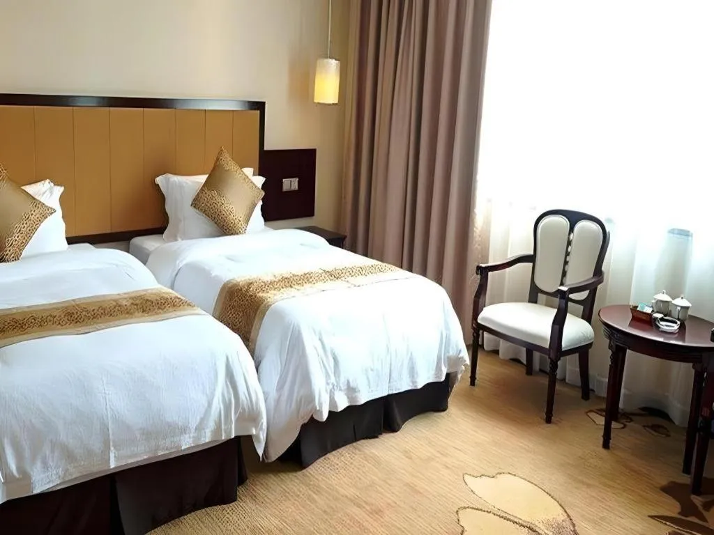 Bed in Sun Island Holiday Hotel