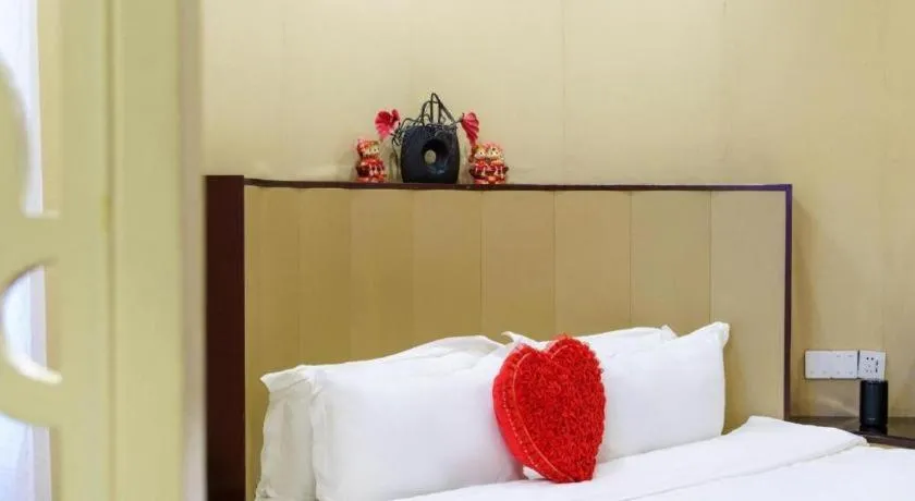 Bed in Sun Island Holiday Hotel