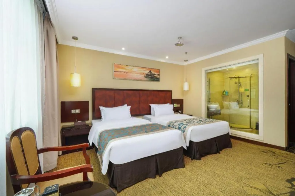 Bed in Sun Island Holiday Hotel