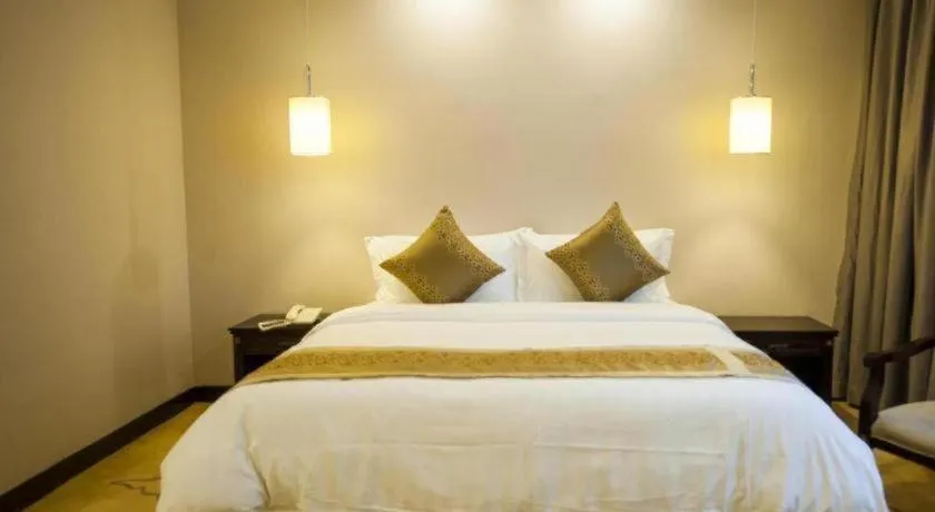 Bed in Sun Island Holiday Hotel