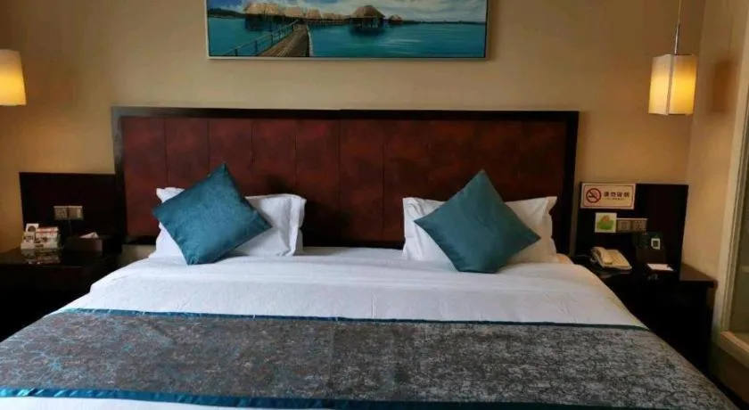 Bed in Sun Island Holiday Hotel