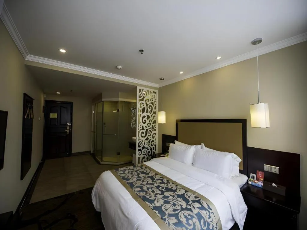 Bed in Sun Island Holiday Hotel