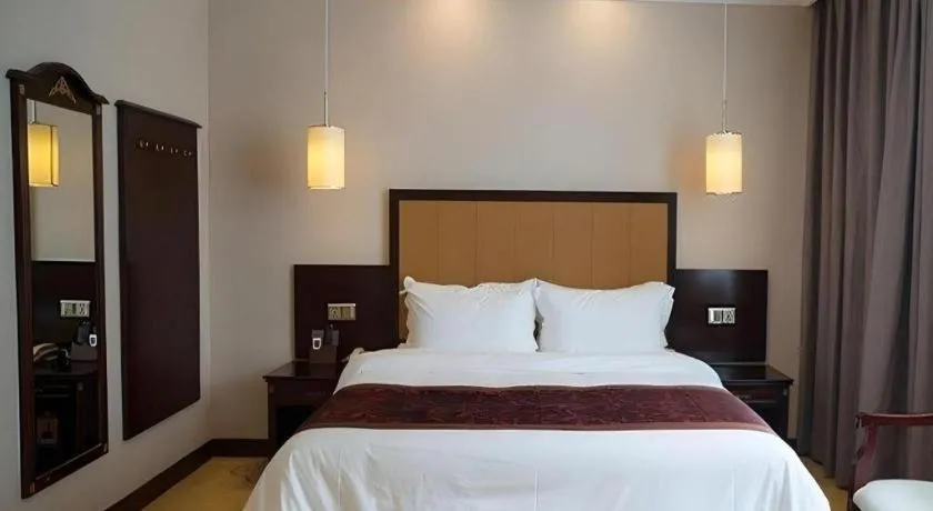 Bed in Sun Island Holiday Hotel