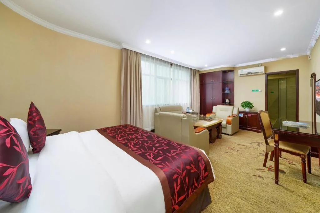 Bed in Sun Island Holiday Hotel