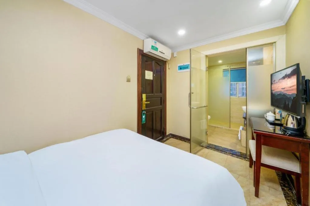 Bed in Sun Island Holiday Hotel