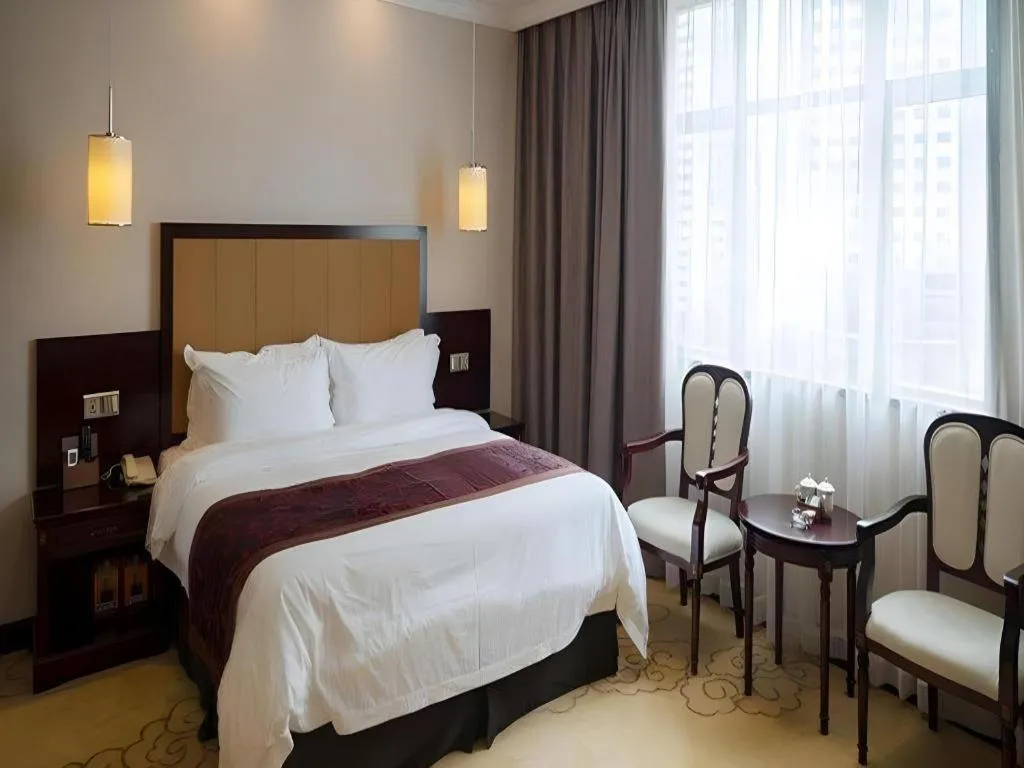 Bed in Sun Island Holiday Hotel