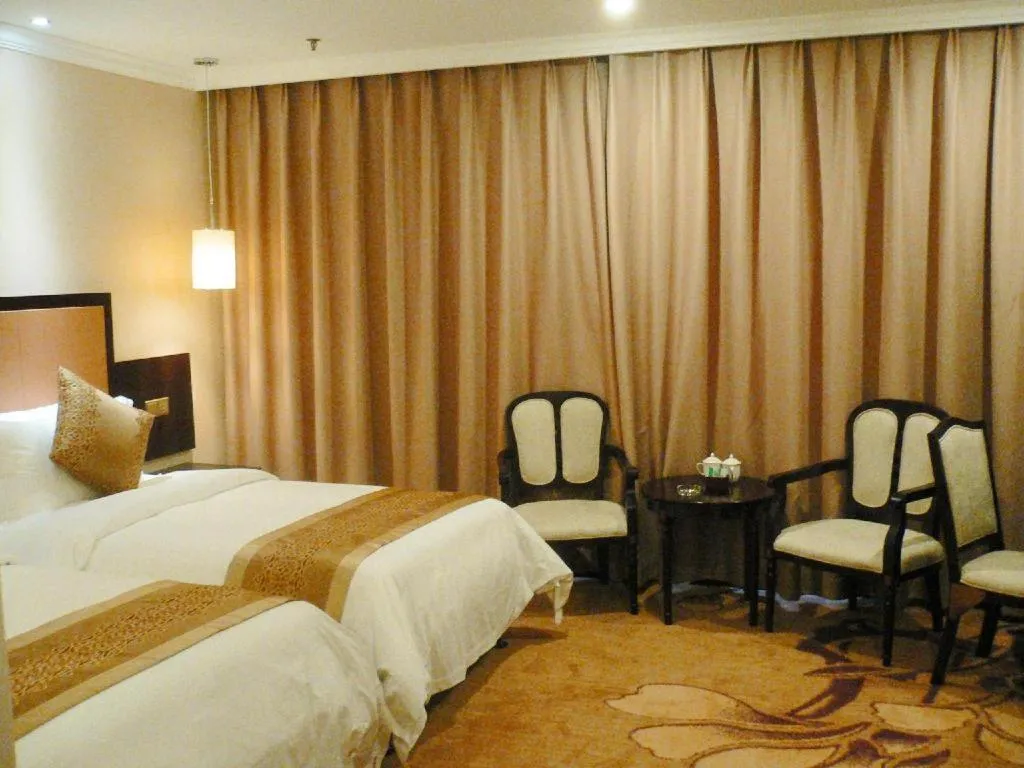 Bed in Sun Island Holiday Hotel