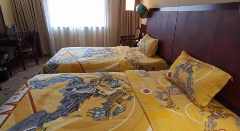 Bed in Sun Island Holiday Hotel