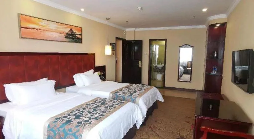 Bed in Sun Island Holiday Hotel