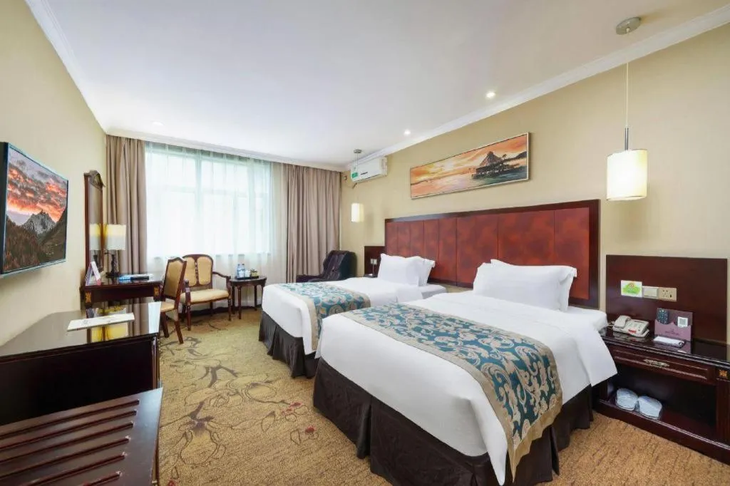 Bed in Sun Island Holiday Hotel