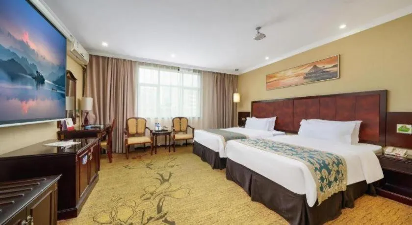 Bed in Sun Island Holiday Hotel