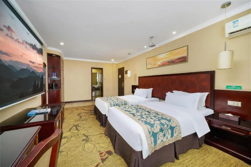 Bed in Sun Island Holiday Hotel