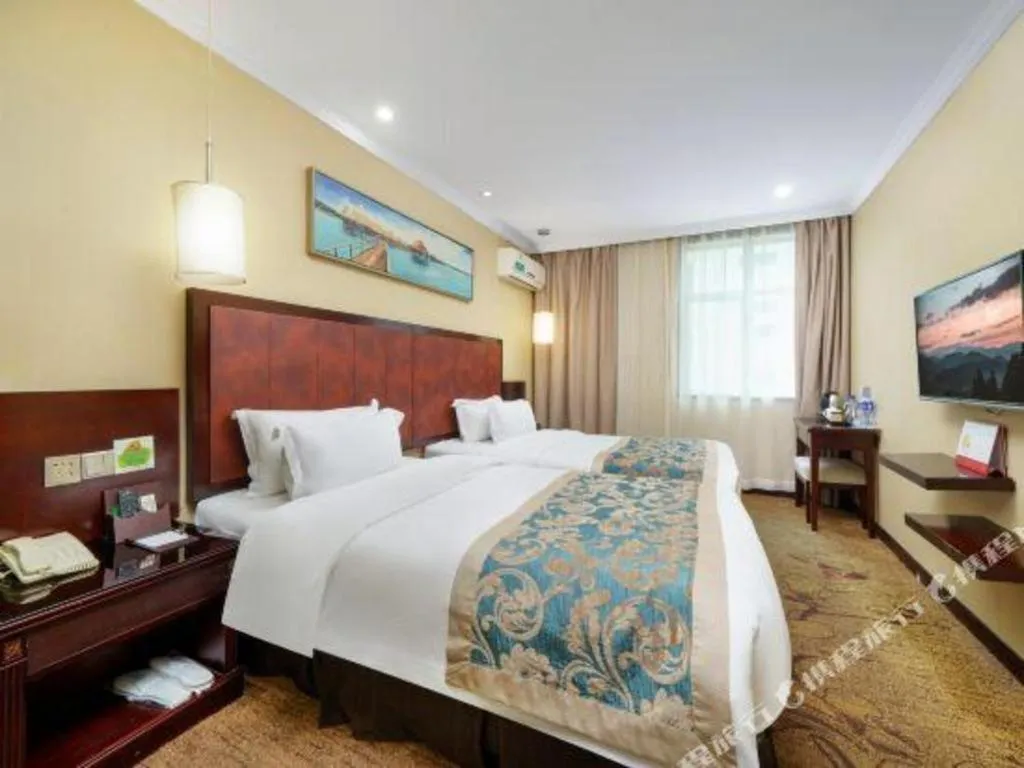 Bed in Sun Island Holiday Hotel